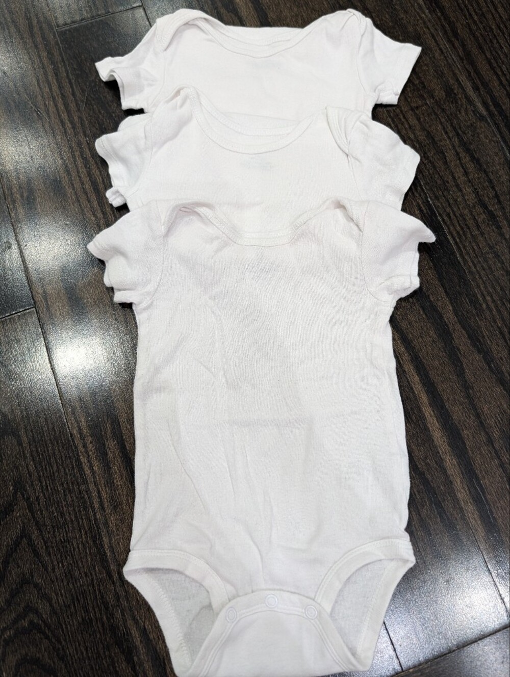 5/$35 Carter’s White Cotton Bodysuits – 12M